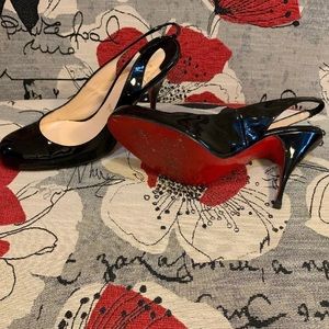 Christian Louboutin patent leather slingback pumps